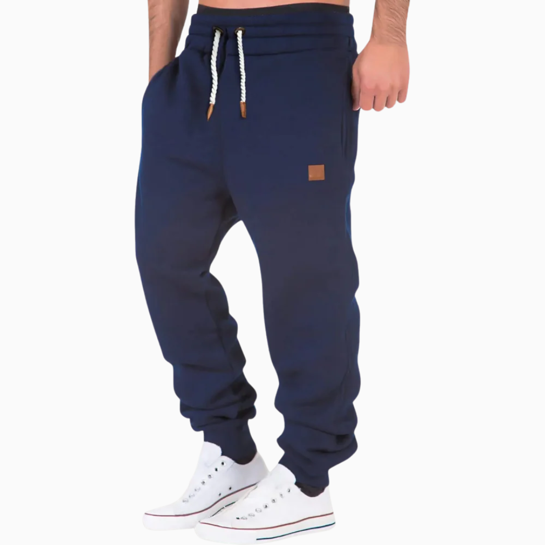 Pantalon jogger homme taille élastique cordon de serrage coupe fuselée chevilles resserrées