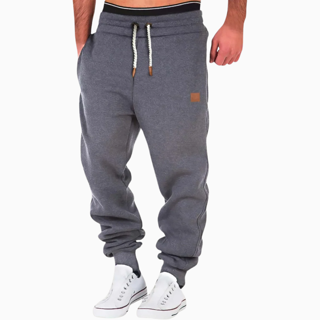 Pantalon jogger homme taille élastique cordon de serrage coupe fuselée chevilles resserrées