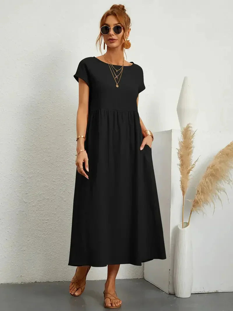 Elira | Robe midi noire femme manches courtes coupe ample style élégant confortable