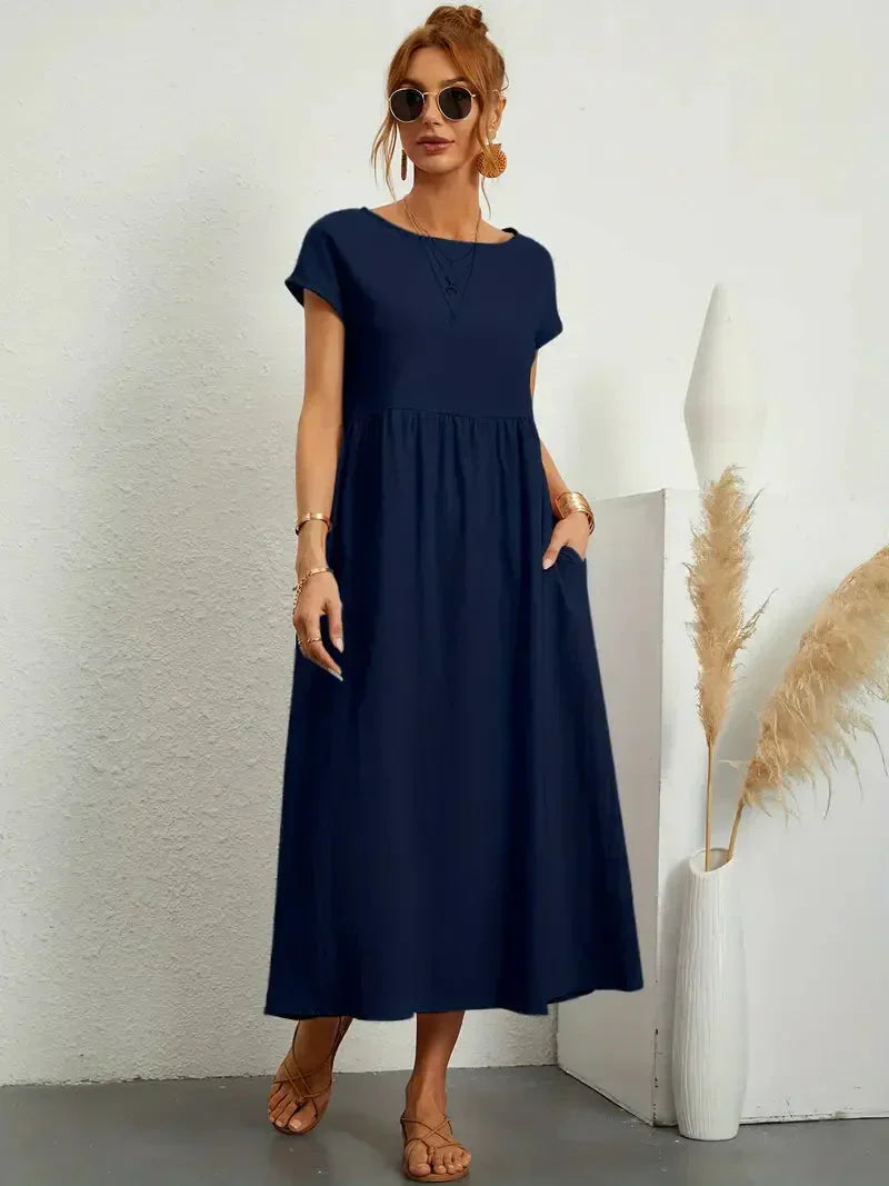 Elira | Robe midi noire femme manches courtes coupe ample style élégant confortable