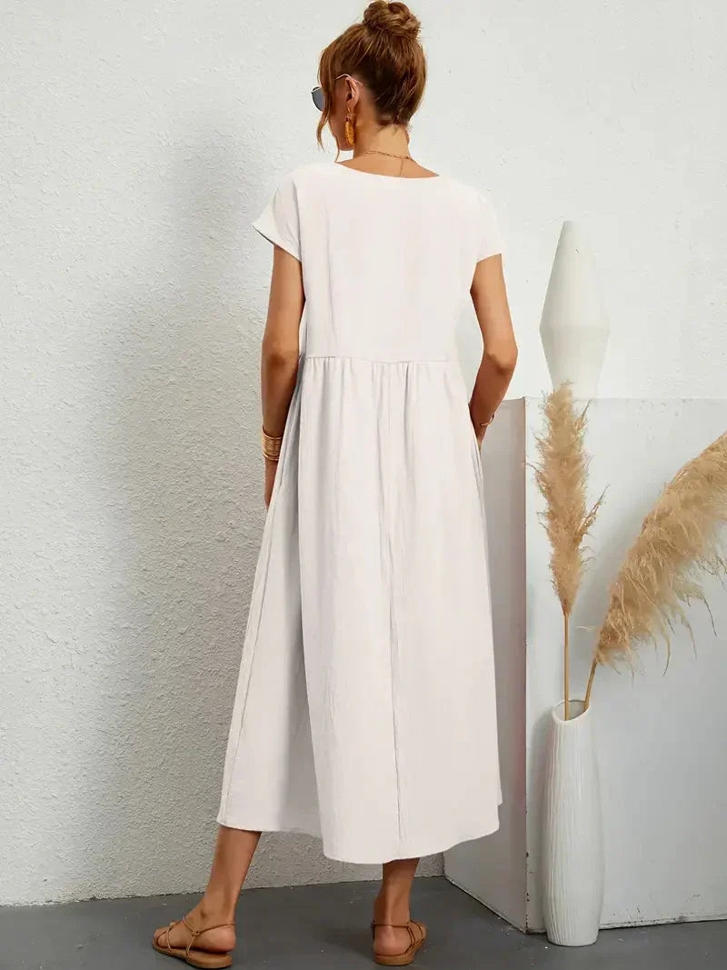 Elira | Robe midi noire femme manches courtes coupe ample style élégant confortable