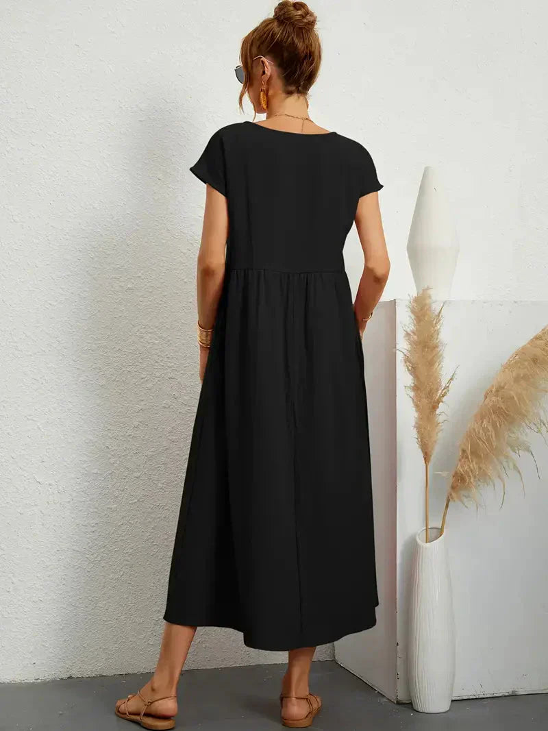 Elira | Robe midi noire femme manches courtes coupe ample style élégant confortable