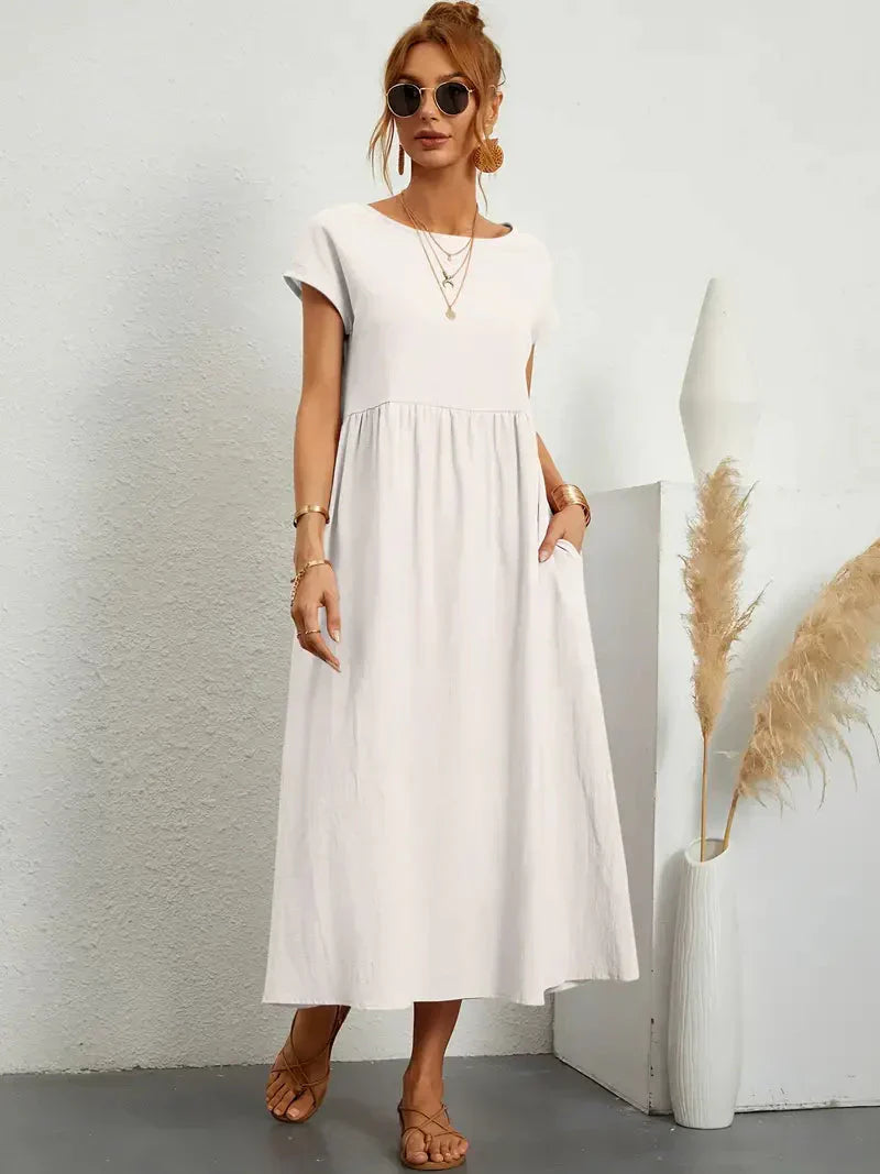 Elira | Robe midi noire femme manches courtes coupe ample style élégant confortable