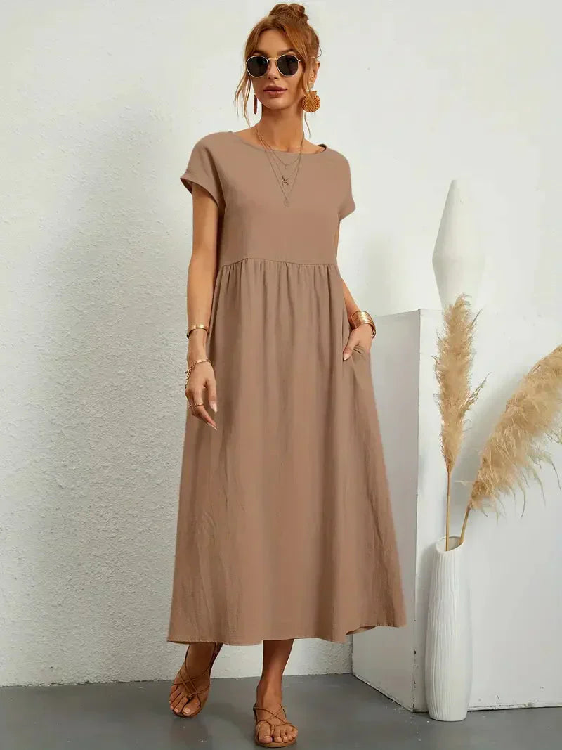 Elira | Robe midi noire femme manches courtes coupe ample style élégant confortable