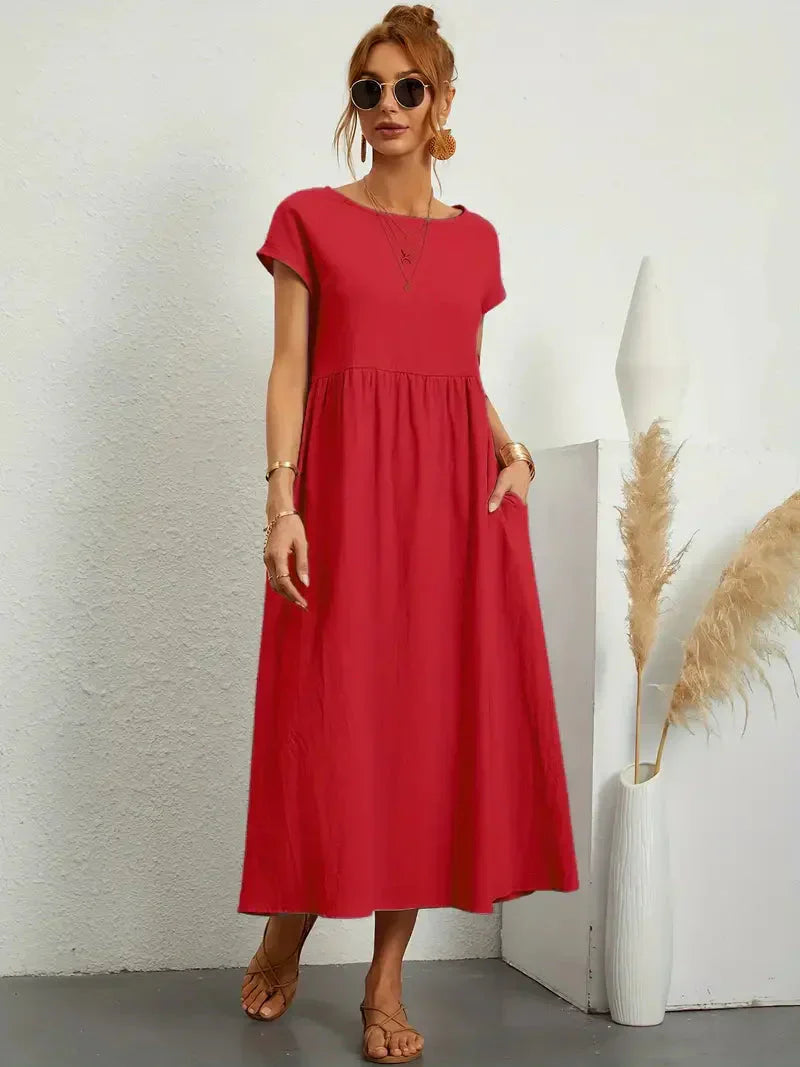 Elira | Robe midi noire femme manches courtes coupe ample style élégant confortable