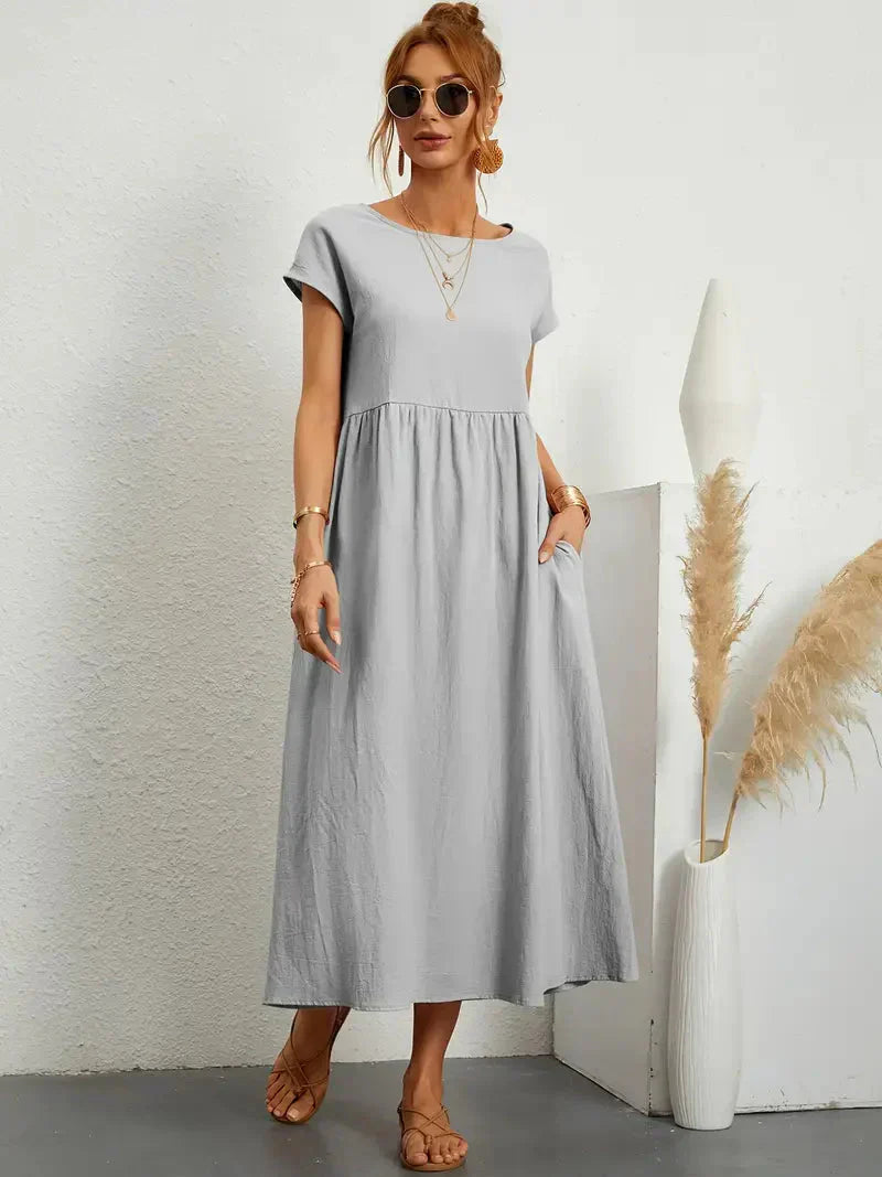 Elira | Robe midi noire femme manches courtes coupe ample style élégant confortable