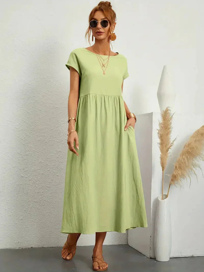 Elira | Robe midi noire femme manches courtes coupe ample style élégant confortable